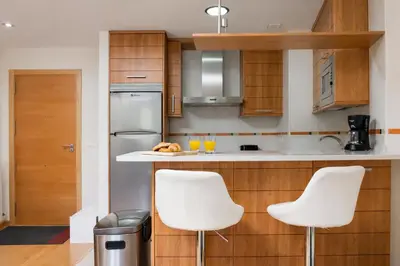 Una cocina o zona de cocina en El mirador de Panticosa l WIFI l Garaje l Vistas