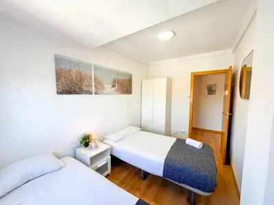 Cama o camas de una habitación en San Juan del Pilar - Turistea