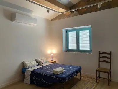 Cama o camas de una habitación en La Caseta de JIO