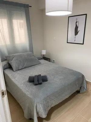 Cama o camas de una habitación en Apartamento Boston