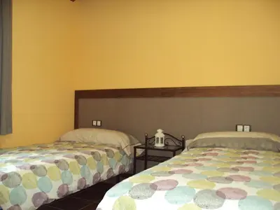 Cama o camas de una habitación en Casa Rural O Fraginal