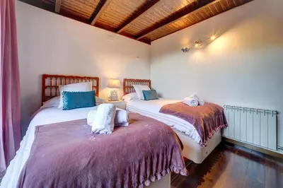 Cama o camas de una habitación en Eth Floc - Dúplex con trasslado gratuito a pistas