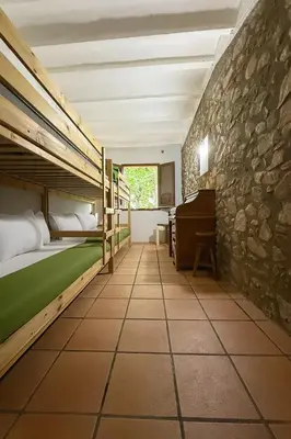 Cama o camas de una habitación en Masia el Tiller