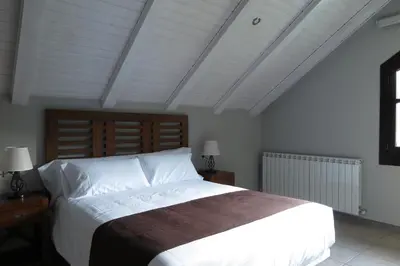 Cama o camas de una habitación en El Molino de Pochas