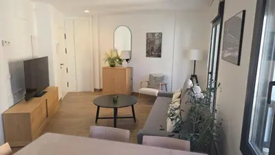 Una televisión o centro de entretenimiento en Apartamentos San Nicolas Jaca