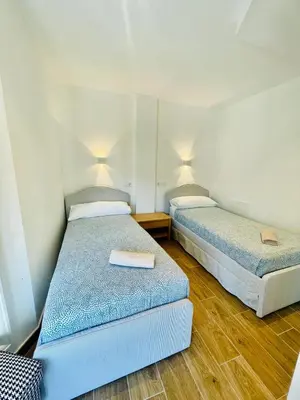 Cama o camas de una habitación en Apartamentos San Nicolas Jaca