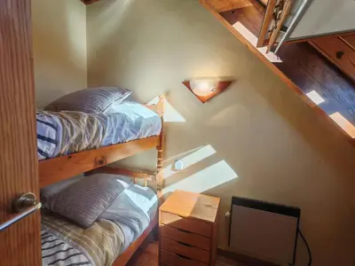 Cama o camas de una habitación en Dúplex acogedor con chimenea cerca de Aigüestortes - Falcó 6