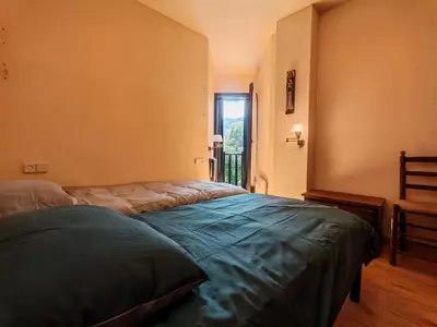 Cama o camas de una habitación en Jardín, parking y barbacoa - Tu espacio de relax - Besiberri 2
