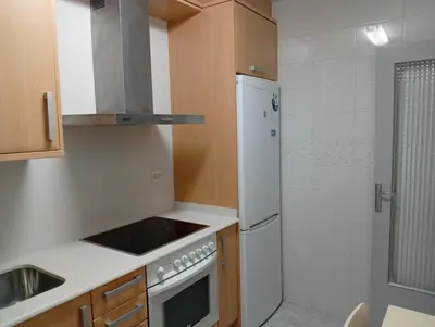 Una cocina o zona de cocina en Alojamiento Cervantes