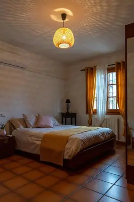 Cama o camas de una habitación en Casa rural La Plana