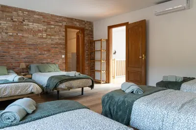 Cama o camas de una habitación en Casa rural La Plana