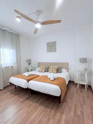 Cama o camas de una habitación en Mi trocito de Sabiñanigo, wifi y garaje
