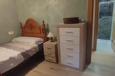 Cama o camas de una habitación en La torre romana