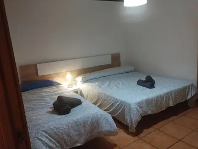 Cama o camas de una habitación en Calatorao apartamentos completos con jardín