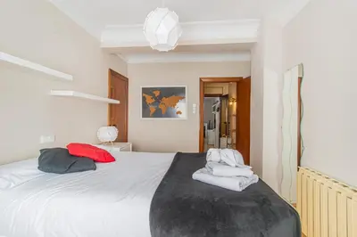 Cama o camas de una habitación en Your Home in the Heart of Zaragoza