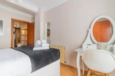 Cama o camas de una habitación en Your Home in the Heart of Zaragoza