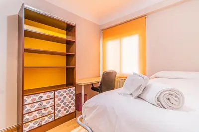 Cama o camas de una habitación en Your Home in the Heart of Zaragoza