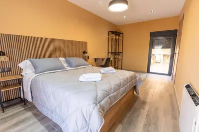 Cama o camas de una habitación en Ca La Padrina