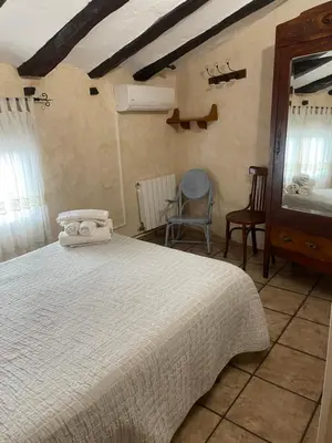 Cama o camas de una habitación en Casa Rural 
