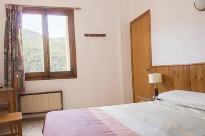 Cama o camas de una habitación en Apartamentos Grist