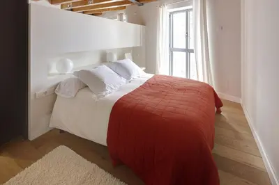 Cama o camas de una habitación en Val Arties 1 by FeelFree Rentals