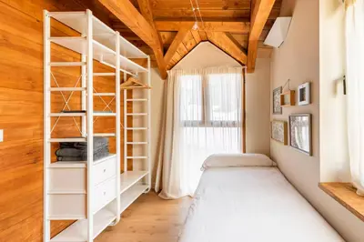 Cama o camas de una habitación en El Pajar de la Leña - tucasaenlospirineos