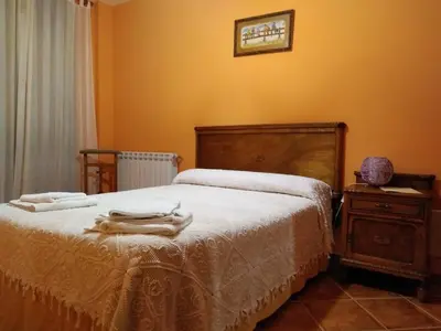 Cama o camas de una habitación en Casa Rural Alicia