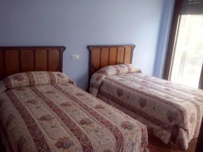 Cama o camas de una habitación en Casa Rural Alicia