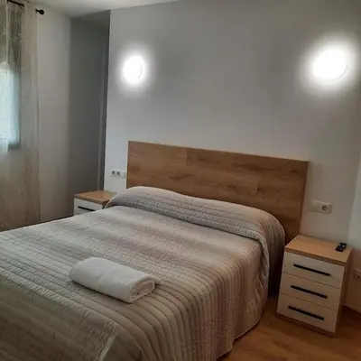 Cama o camas de una habitación en Duplex LLORACH I