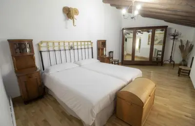 Cama o camas de una habitación en Casa rural Casa Leles