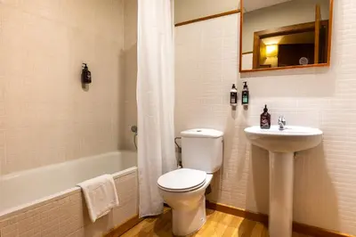 Un baño de Hotel Nau Iori