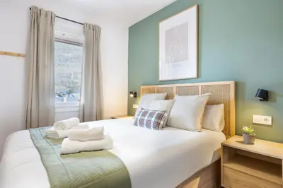 Cama o camas de una habitación en S14 eraclau - Eth Malhòl en Sapporo Vielha