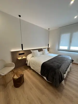 Cama o camas de una habitación en El tossalet Hotel - Apartament