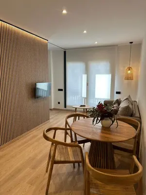 Una televisión o centro de entretenimiento en El tossalet Hotel - Apartament