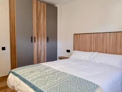 Cama o camas de una habitación en Apartamentos Casa Domec
