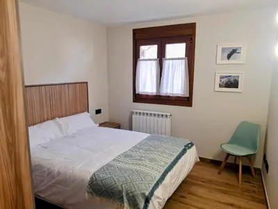 Cama o camas de una habitación en Apartamentos Casa Domec
