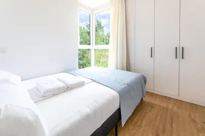 Cama o camas de una habitación en Las casitas de mache - LAGOSSA