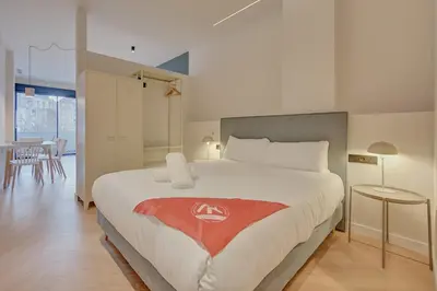 Cama o camas de una habitación en Parque central D by Clabao