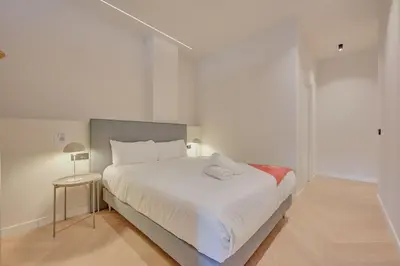 Cama o camas de una habitación en Parque central D by Clabao