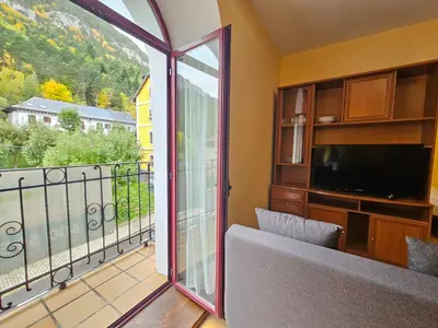 Una televisión o centro de entretenimiento en Apartamentos Canfranc 3000