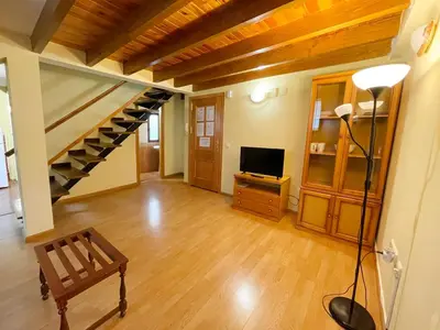 Una televisión o centro de entretenimiento en Apartamentos Canfranc 3000