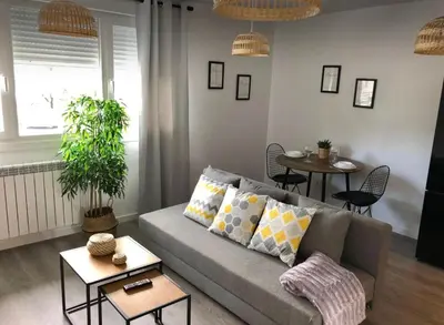 Zona de estar de Apartamento con Jardin y Garaje