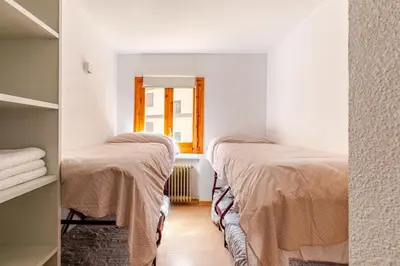 Cama o camas de una habitación en Socotor by Pirineos360 en la Plaza del Reloj