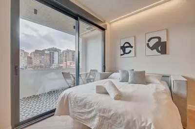 Cama o camas de una habitación en Parque central C by Clabao