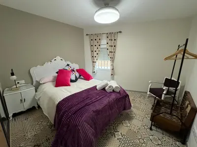 Cama o camas de una habitación en Apartamento El Alfar