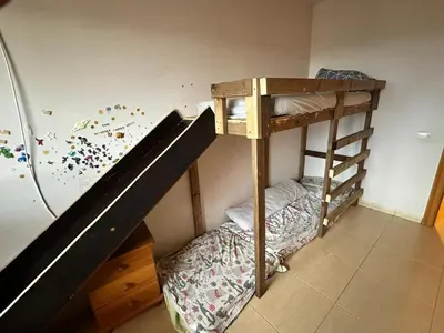 Cama o camas de una habitación en La Muntanera