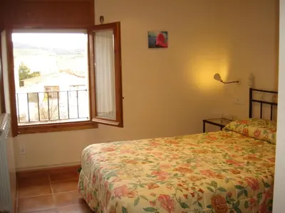 Cama o camas de una habitación en Casa Trillo Apartamentos