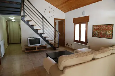 Una televisión o centro de entretenimiento en Casa Trillo Apartamentos