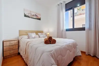 Cama o camas de una habitación en Apartamentos de Ángel