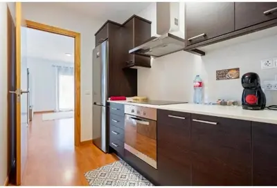 Una cocina o zona de cocina en Apartamentos de Miguel